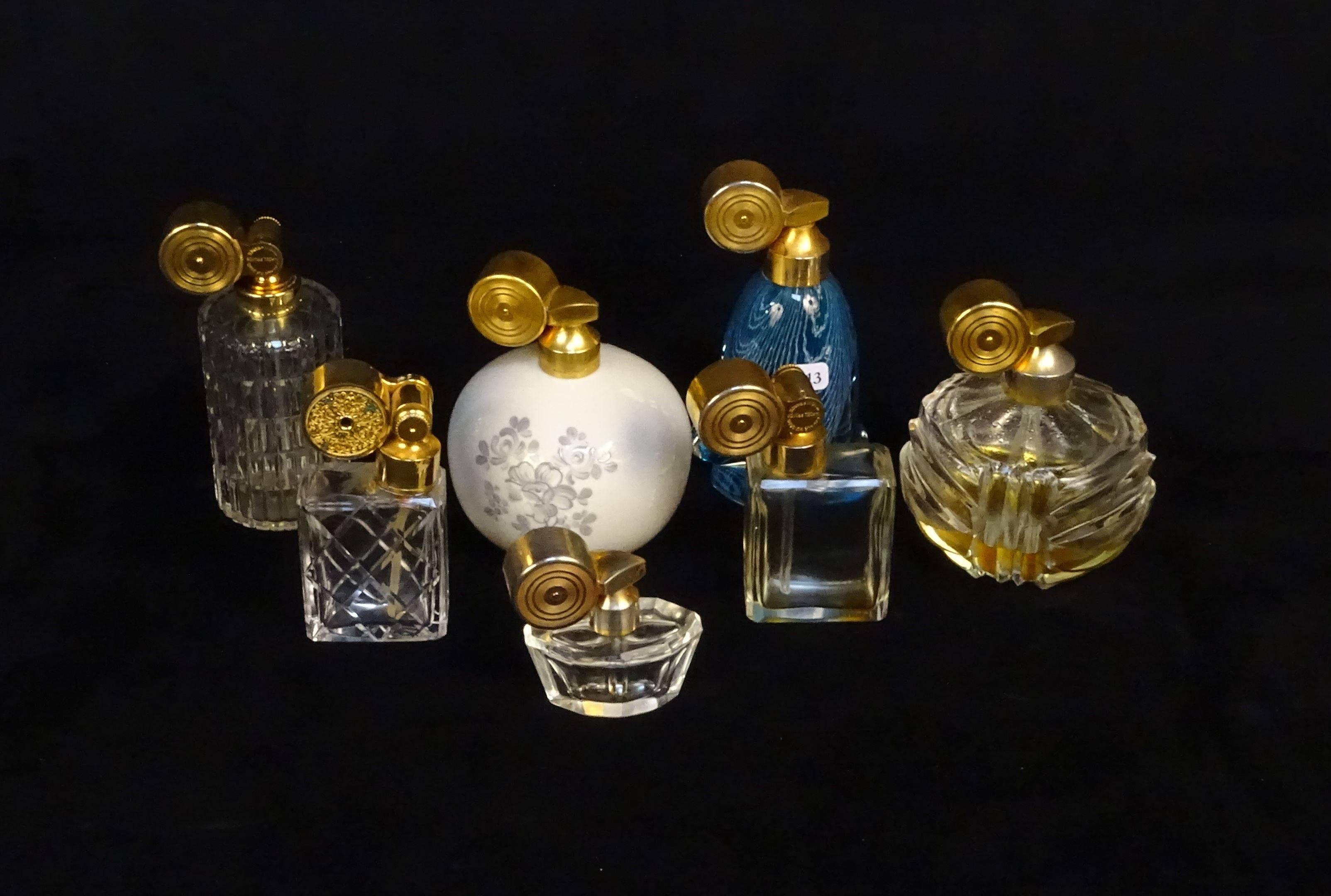 MARCEL FRANCK - Série de 7 flacons vaporisateurs en cristal