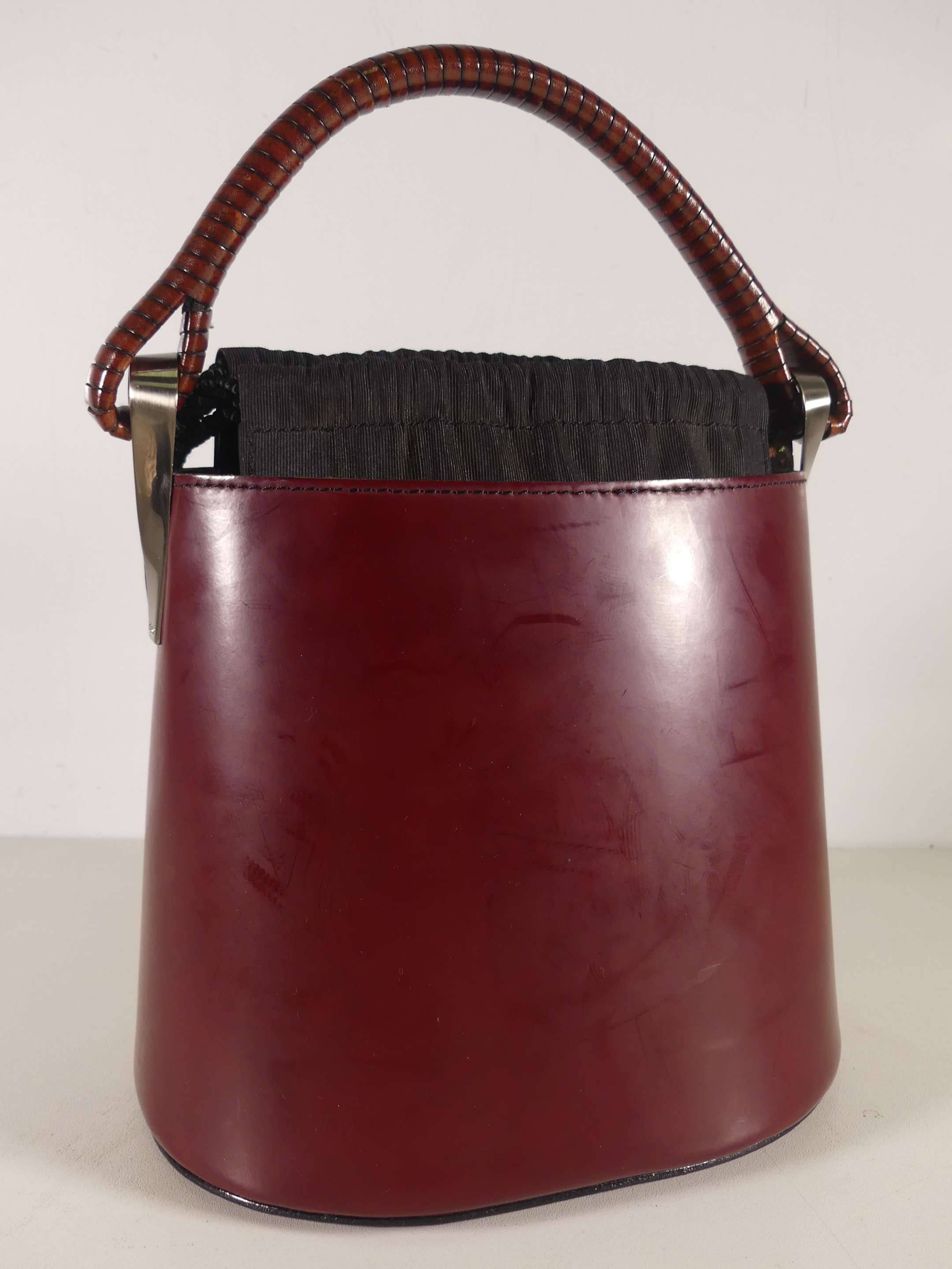 KENZO Sac seau mod le Pagode en box lie de vin l anse tress e