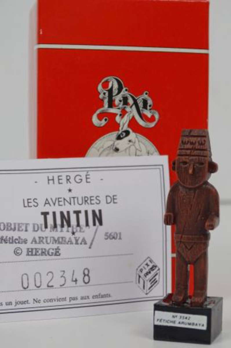 Pixi Tintin : L'objet du mythe, Le fétiche Arumbaya, réf. 5601, en boite,  avec certificat, Vente aux enchères : Livres - Manuscrits - Autographes -  Bandes dessinées