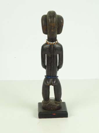 Ancienne statuette votive en bois dur noirci, 