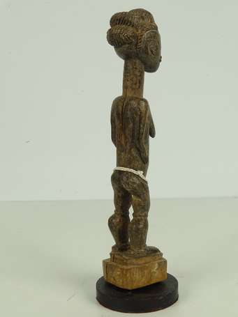 Ancienne statuette votive en bois dur à patine 