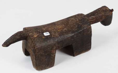 Un appui-nuque ou petit siège en bois. Longueur 42