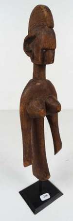 Un buste féminin en bois. Hauteur 29 cm. Malinké. 