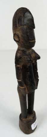 Une ancienne statuette en bois ou haut de canne. 