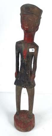 Ancienne statuette colon en bois représentant un 