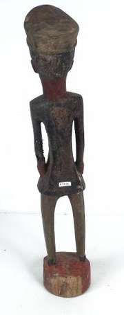 Ancienne statuette colon en bois représentant un 