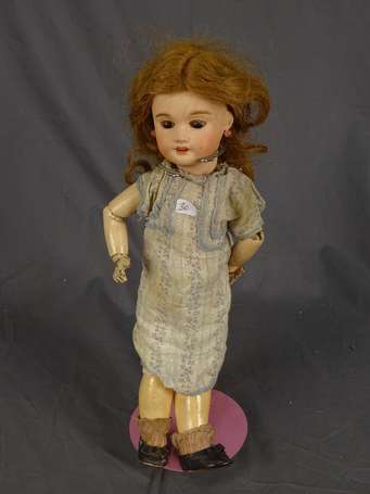 Poupée tête porcelaine LIMOGE, 