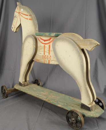 Cheval en bois sur roulettes, hauteur 70 cm 