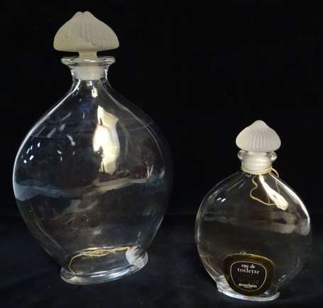 GUERLAIN - Deux flacons vides en verre modèle 