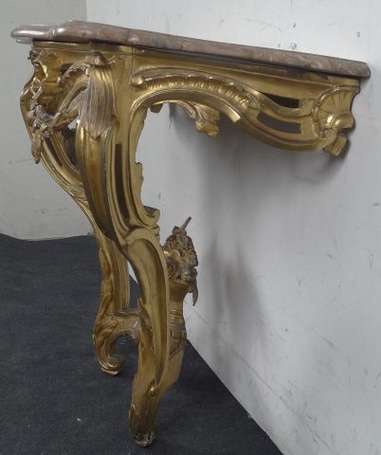 Console en bois doré mouluré et sculpté de nœud de