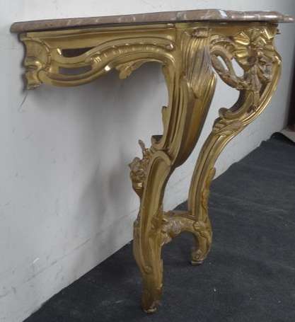 Console en bois doré mouluré et sculpté de nœud de