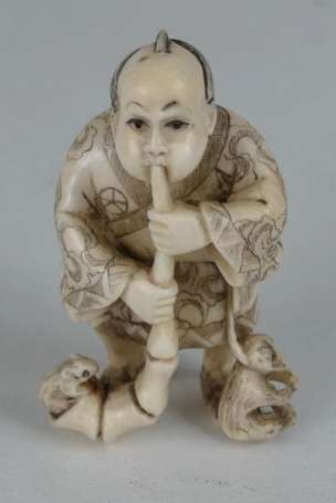 Montreur de singe Netsuke en ivoire. Japon H. 5,5 