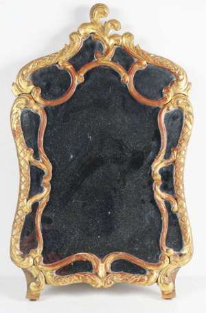 Miroir à platebande, le cadre de bois doré sculpté