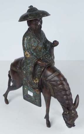 Toba chevauchant sa mule Sujet en bronze et émaux 