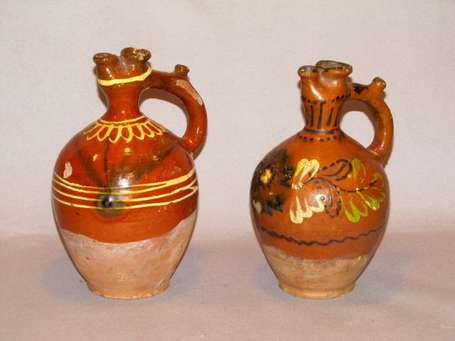 Deux gourdes en céramiques vernissées. H : 23 cm.