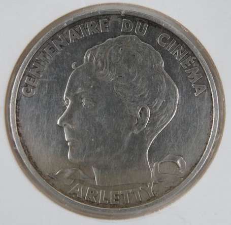 Lot de 5 monnaies divers + 2 jetons. 2 pièces 