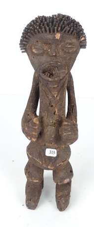 Ancienne statuette votive dans le style classique 