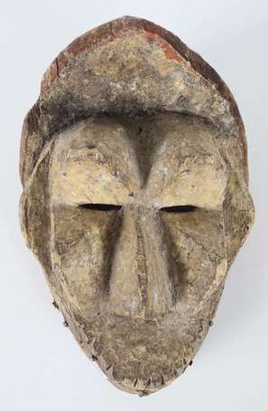 Ancien masque de danse en bois polychrome 'Eku'. 