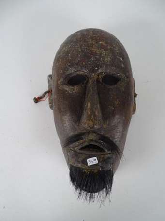 Ancien masque de cérémonie en bois dur à oreilles 
