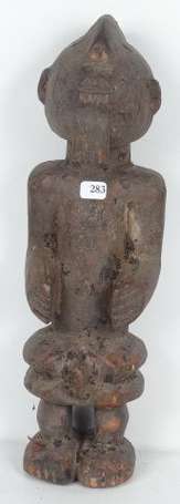 Ancienne statuette votive en bois dur représentant