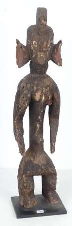 Ancienne statuette votive en bois dur aux oreilles