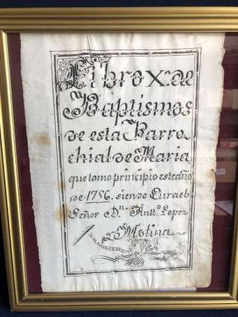 Manuscrit - une page encadrée provenant d'un livre