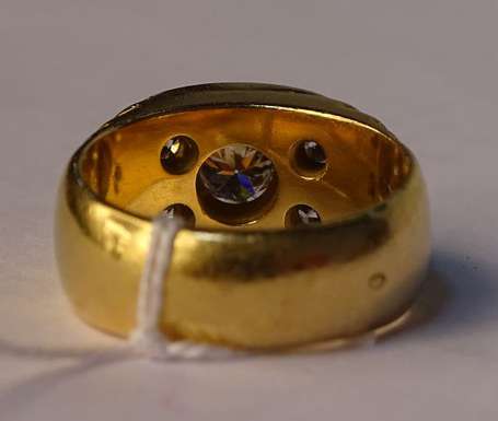 Bague jonc en or jaune 18K (750°/00) ornée d'un 