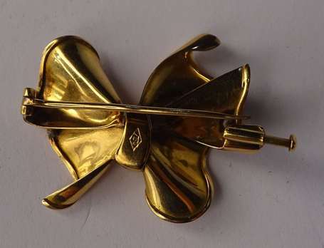 Broche nœud en or deux tons 18K (750°/00). Epingle