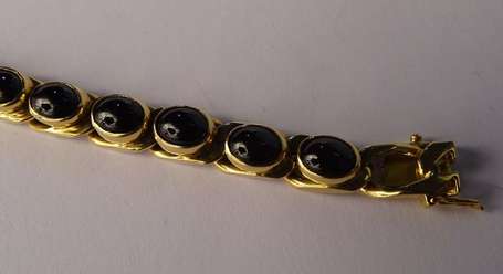 Bracelet gourmette en or jaune 18K agrémenté de 