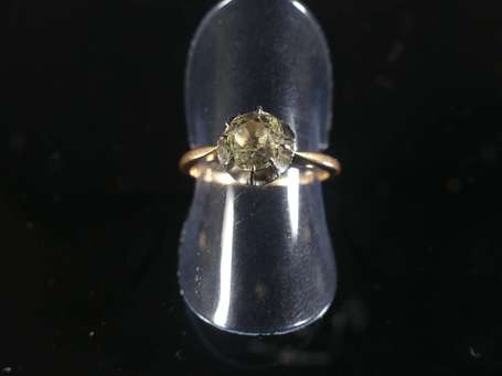 Bague solitaire en or jaune 18K (750°/00) et 