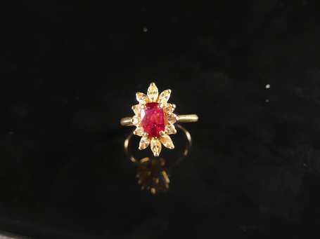 Bague en or jaune 18K (750°/00) sertie d'un rubis 