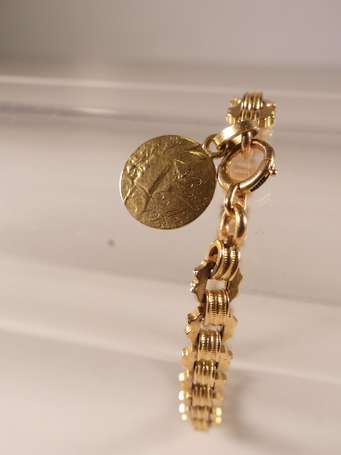 Bracelet en or jaune maille fantaisie monté d'une 