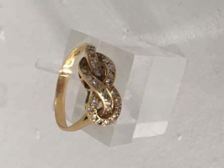 Bague en or jaune 18K (750°/00) formant un nœud 