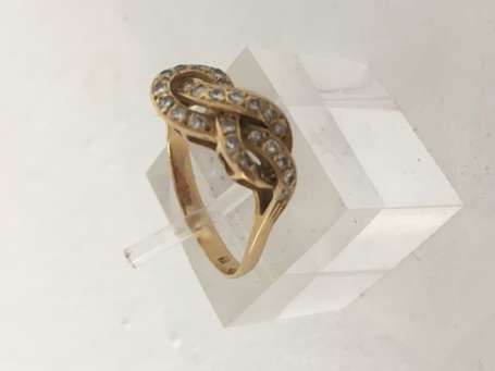 Bague en or jaune 18K (750°/00) formant un nœud 