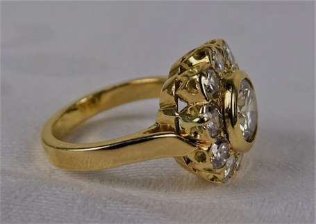 Bague marguerite en or jaune 18K (750°/00) montée 