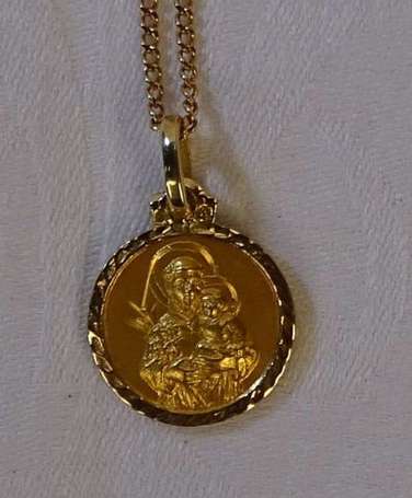 Médaille en or jaune 18K (750°/00) à l'effigie de 