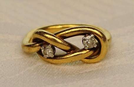 Bague nœud en or jaune 18K (750°/00) sertie 