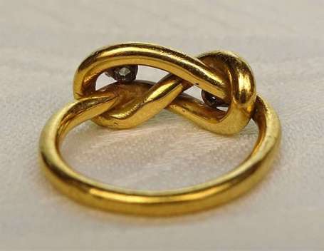 Bague nœud en or jaune 18K (750°/00) sertie 