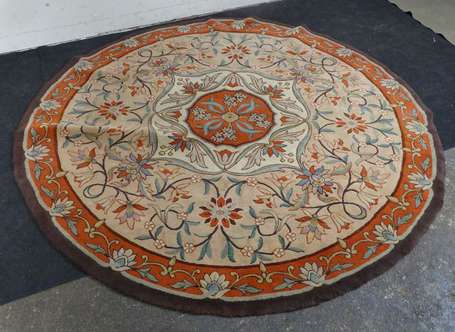 Tapis circulaire en laine polychrome à motif 