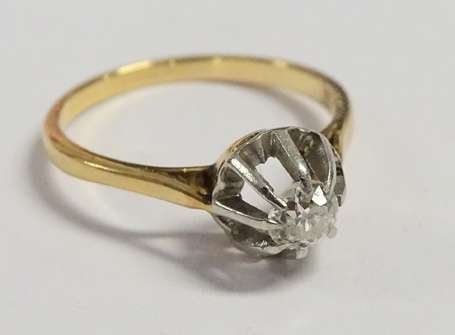 Bague solitaire en or deux tons 18K (750°/00) 