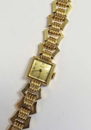 Montre bracelet tank de dame en or jaune 18K 