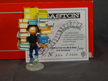 Franquin - Pixi : Gaston portant une pile de 