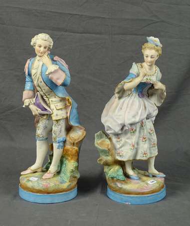 Couple. Deux sujets en biscuit polychrome. H. 34,5