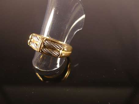 Bague en or jaune 18K (750°/00) et câbles d'acier.