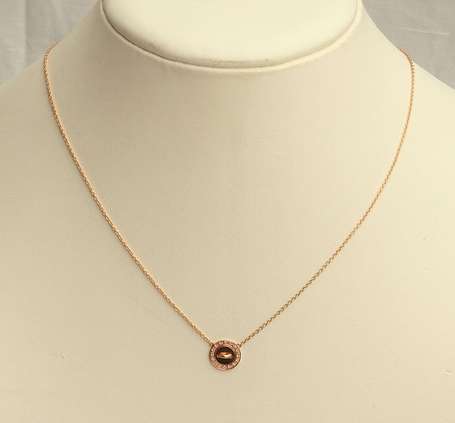 Collier en or rose 18K (750°/00) retenant en 