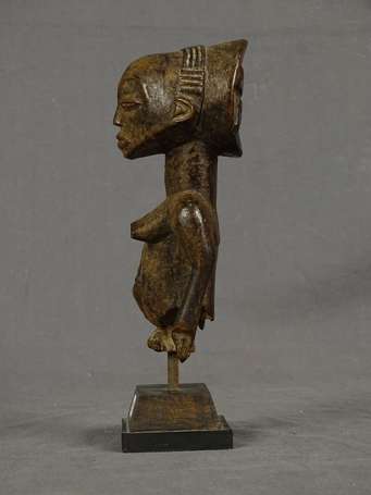 Ancienne statuette votive en bois dur à la patine 