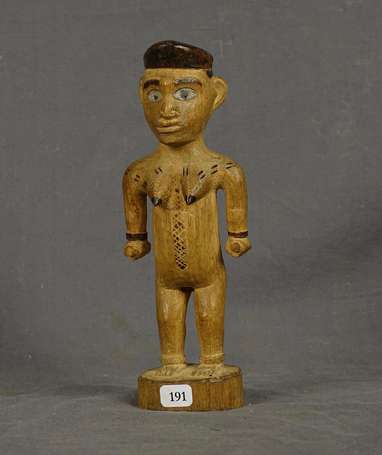 Ancienne petite statuette votive en bois mi-dur à 