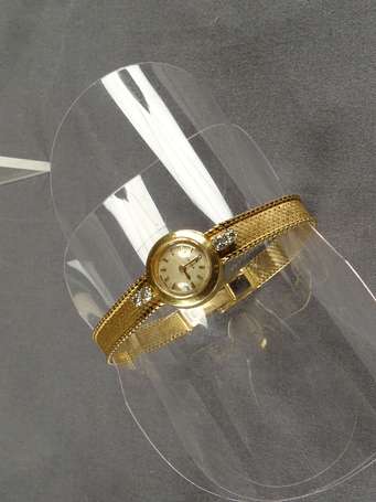 OMEGA - Montre bracelet de dame en or jaune 18K 