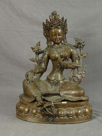 NEPAL - Divinité en bronze sur un socle lotiforme,