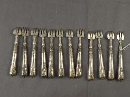 12 fourchettes à huitre en argent, manche argent 
